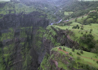 Aerial View of Monsoon Waterfall and Misty Mountains in Maharashtra India