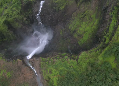 Aerial View of Monsoon Waterfall and Misty Mountains in Maharashtra India