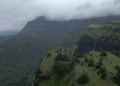 Aerial View of Monsoon Waterfall and Misty Mountains in Maharashtra India