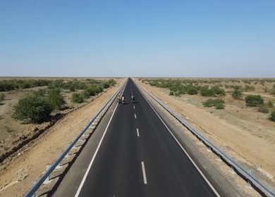 Aerial View of Motorcycles Riding on Desert Highway in Kutch Gujarat India