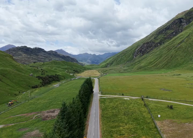 Aerial View of Mount Aspiring Road and Green Valley Near Wanaka New Zealand
