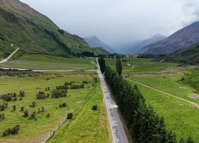 Aerial View of Mount Aspiring Road and Green Valley Near Wanaka New Zealand