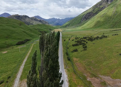 Aerial View of Mount Aspiring Road and Green Valley Near Wanaka New Zealand