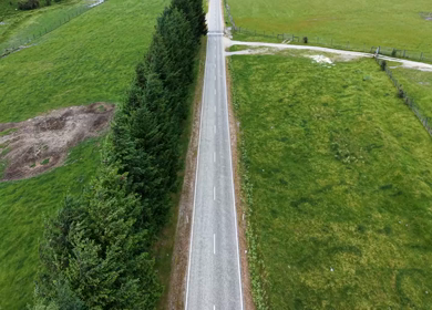 Aerial View of Mount Aspiring Road and Green Valley Near Wanaka New Zealand
