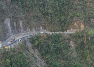 Aerial View of Mountain Road Along River Valley Near Devprayag Uttarakhand India