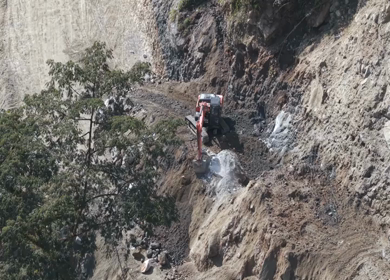 05th April 2026 : Aerial View of Mountain Road Construction and Landslide Clearing in India