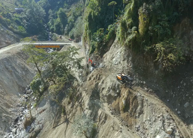 Aerial View of Mountain Road Construction and Landslide Clearing in India