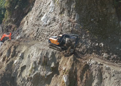05th April 2026 : Aerial View of Mountain Road Construction and Landslide Clearing in India