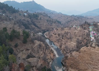 Aerial View of Mountain Village and River Valley in Uttarakhand India