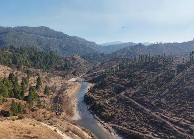 Aerial View of Mountain Village and River Valley in Uttarakhand India