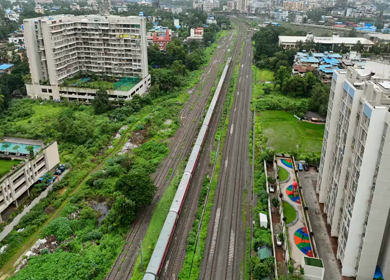 Aerial View of Mumbai Suburban Railway and Urban Landscape Maharashtra India