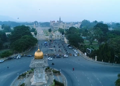 Aerial View of Nalwadi Krishnaraja Wodeyar Statue with Mysuru Palace in Karnataka, India