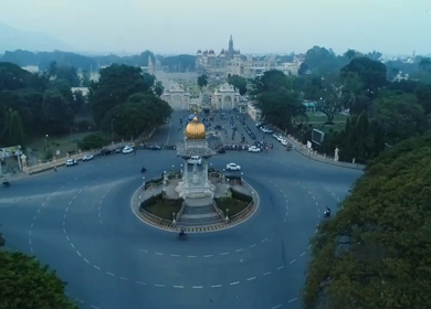 Aerial View of Nalwadi Krishnaraja Wodeyar Statue with Mysuru Palace in Karnataka, India