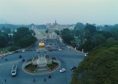 Aerial View of Nalwadi Krishnaraja Wodeyar Statue with Mysuru Palace in Karnataka, India