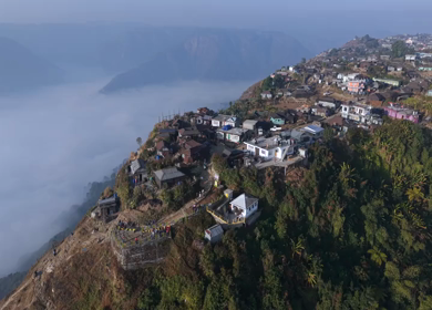 Aerial View of Nongjrong Village Above Sea of Clouds in Meghalaya