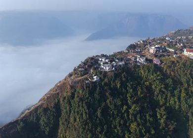 Aerial View of Nongjrong Village Above Sea of Clouds in Meghalaya
