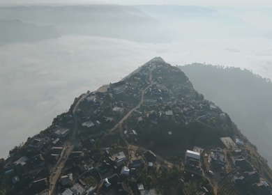 Aerial View of Nongjrong Village Above Sea of Clouds in Meghalaya