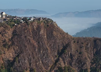 Aerial View of Nongjrong Village Above Sea of Clouds in Meghalaya