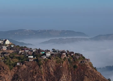 Aerial View of Nongjrong Village Above Sea of Clouds in Meghalaya