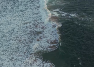 Aerial View of Ocean Waves Crashing on Beach Kerala India
