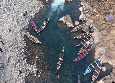 Aerial View of People Enjoying Boat Ride on Crystal Clear Umngot River in Dawki Meghalaya India