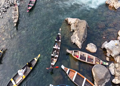 Aerial View of People Enjoying Boat Ride on Crystal Clear Umngot River in Dawki Meghalaya India