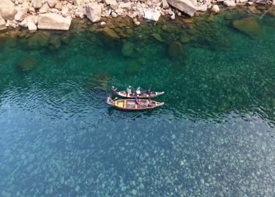 Aerial View of People Enjoying Boat Ride on Crystal Clear Umngot River in Dawki Meghalaya India