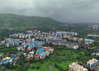 Aerial View of Pune City with Green Hills and Monsoon Landscape Maharashtra India