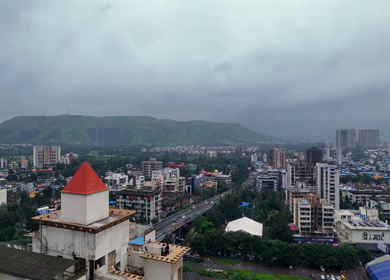 Aerial View of Pune City with Green Hills and Monsoon Landscape Maharashtra India