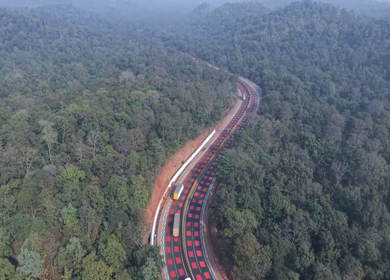 Aerial View of Red Wildlife Highway Through Forest in Madhya Pradesh India