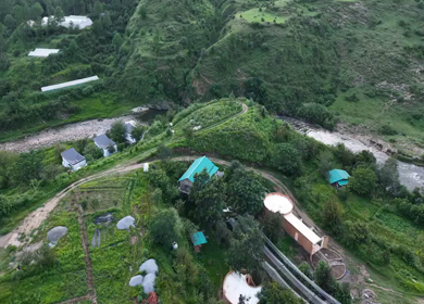 Aerial View of River Valley, Forested Hills and Mountain Lodges in Almora, Uttarakhand
