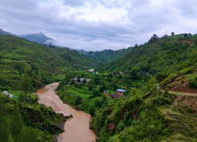 Aerial View of River Valley, Forested Hills and Mountain Lodges in Almora, Uttarakhand