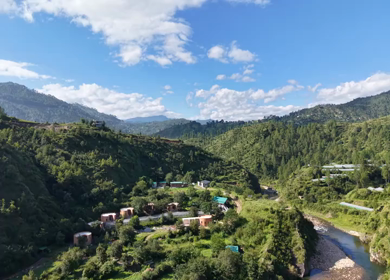 Aerial View of River Valley, Forested Hills and Mountain Lodges in Almora, Uttarakhand
