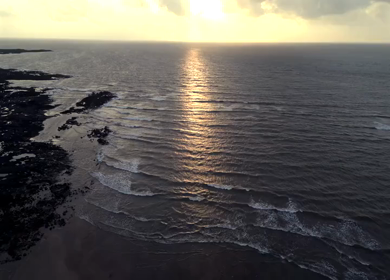 Aerial View of Rocky Coastline and Arabian Sea at Sunset Maharashtra