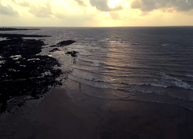 Aerial View of Rocky Coastline and Arabian Sea at Sunset Maharashtra