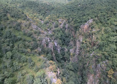 Aerial View of Rocky Stream and Lush Forest Landscape Pratapgarh Rajasthan India