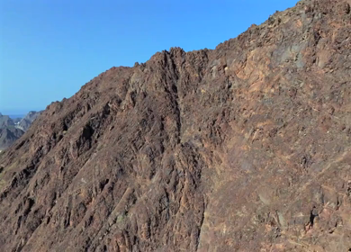 Aerial View of Rugged Mountains and Gulf of Oman Coastline Muscat Oman