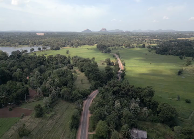 Aerial View of Rural Hiriwadunna with Sigiriya and Pidurangala Rocks Sri Lanka