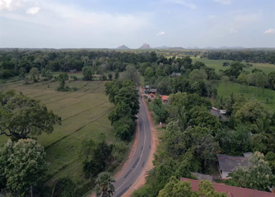 Aerial View of Rural Hiriwadunna with Sigiriya and Pidurangala Rocks Sri Lanka