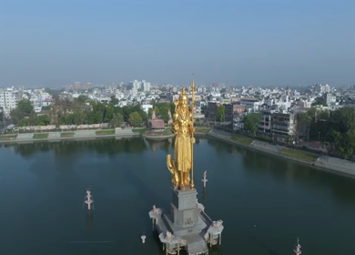 Aerial View of Sarveshwar Mahadev Golden Shiva Statue at Sursagar Lake, Vadodara, Gujarat