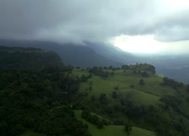 Aerial View of Scenic Mountain Ridges and Green Plateau in Maharashtra