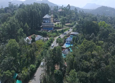 Aerial View of Scenic Mountain Roads and Tea Plantations in Munnar, Kerala, India
