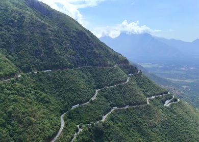 Aerial View of Scenic Mountain Roads and Tea Plantations in Munnar, Kerala, India