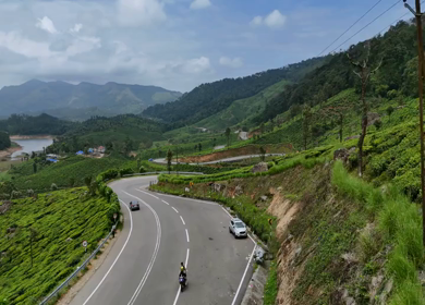Aerial View of Scenic Mountain Roads and Tea Plantations in Munnar, Kerala, India