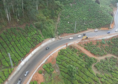 Aerial View of Scenic Mountain Roads and Tea Plantations in Munnar, Kerala, India