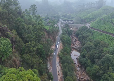 Aerial View of Scenic Mountain Roads and Tea Plantations in Munnar, Kerala, India