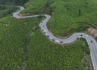 Aerial View of Scenic Mountain Roads and Tea Plantations in Munnar, Kerala, India