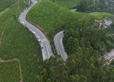 Aerial View of Scenic Mountain Roads and Tea Plantations in Munnar, Kerala, India