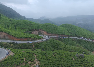 Aerial View of Scenic Mountain Roads and Tea Plantations in Munnar, Kerala, India