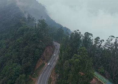 Aerial View of Scenic Mountain Roads and Tea Plantations in Munnar, Kerala, India